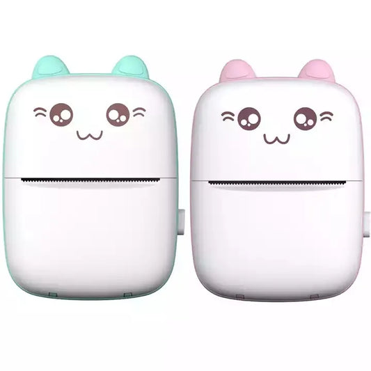 Two small electronic devices with cute face designs on a white background
