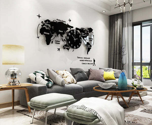 Modern living room with a gray sectional sofa, decorative pillows, and a world map wall clock.