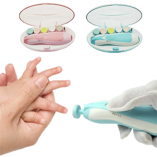 Baby nail clipper set with a hand for scale on a white background