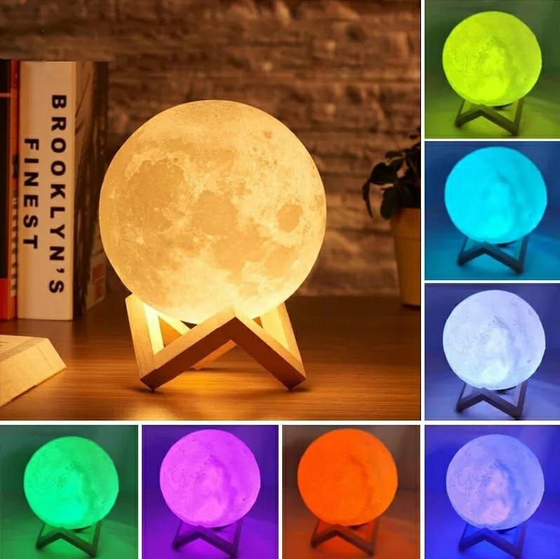 Moon-shaped lamp displaying various color options on a wooden stand.